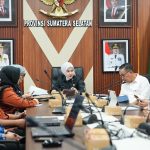 Kepala Dinas Kominfo Rika Efianti membuka rapat SAQ E-Monev Komisi Informasi Pusat tahun 2026